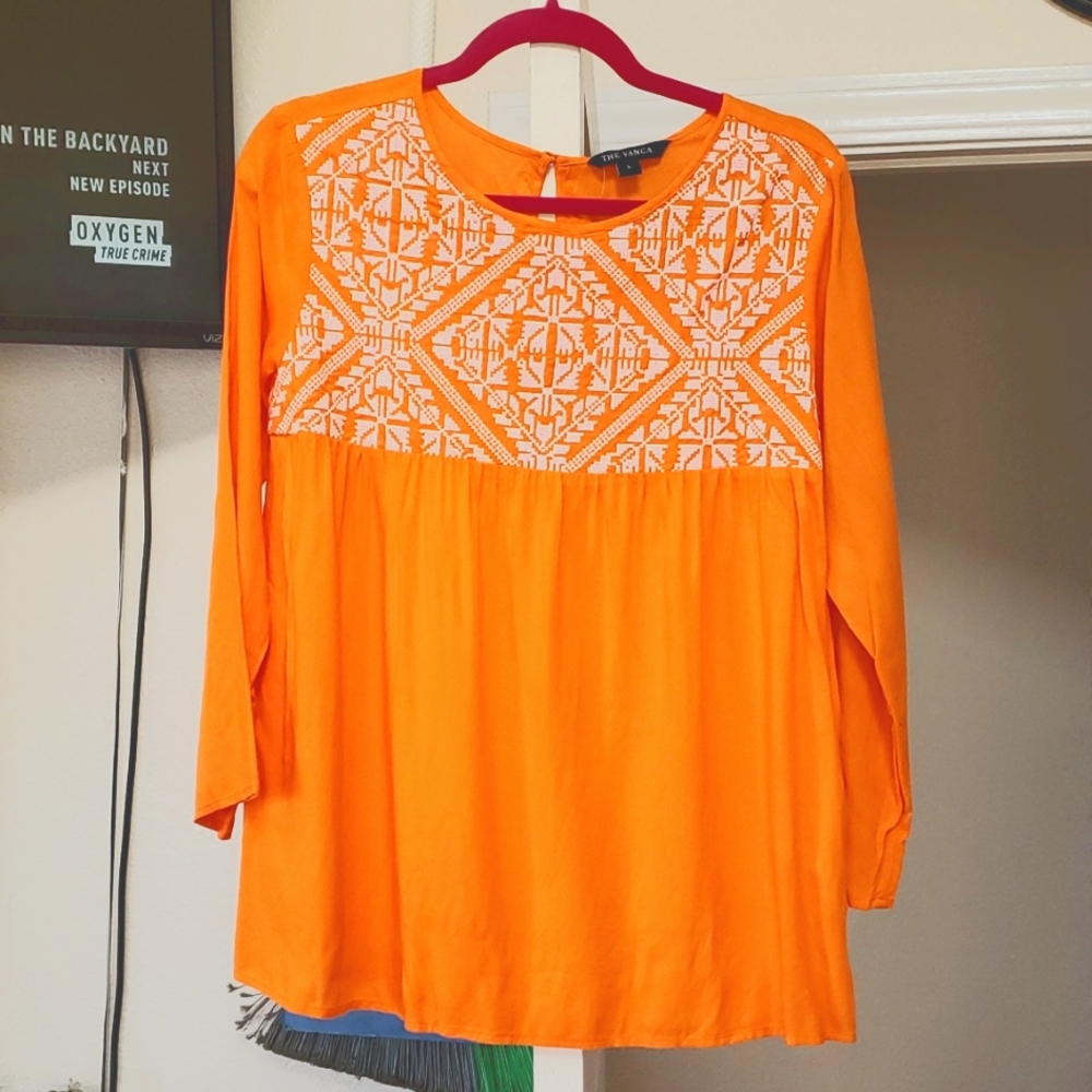 Orange blouse,  size large.